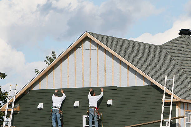 Professional Storm Damage Siding Repair technician working in Fairview, NJ
